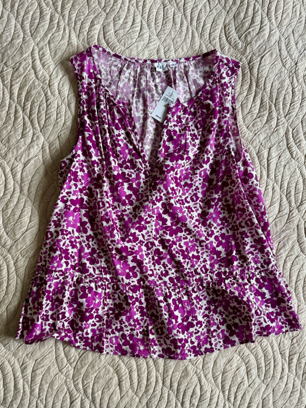 GAP sleeveless peplum top - XS